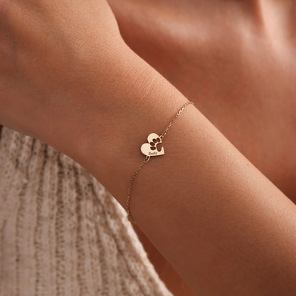 Bracelet personnalisé avec patte sur cœur et nom
